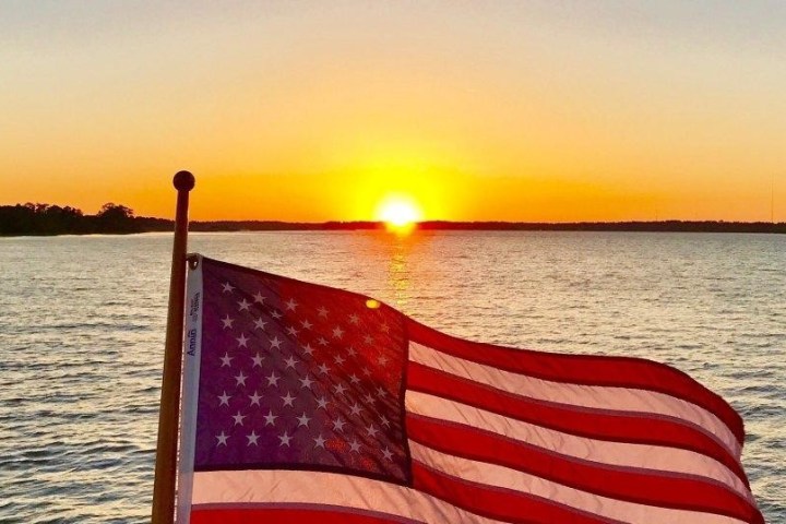 American flag and sunset